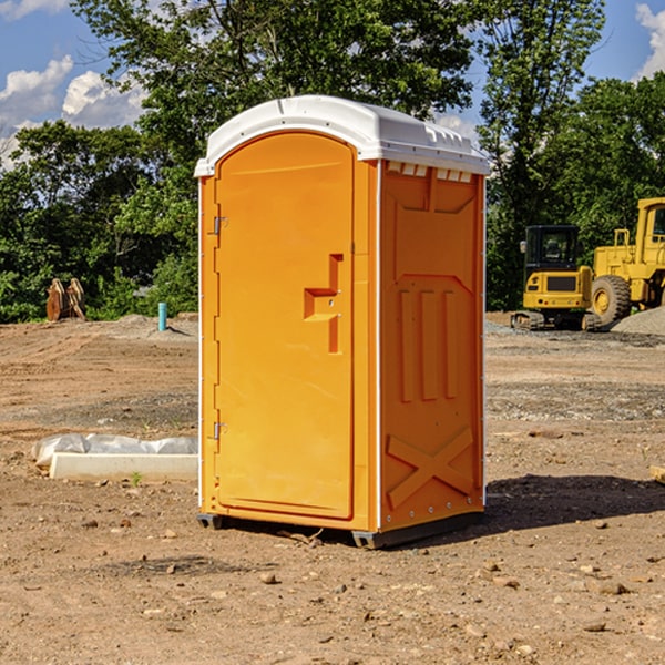 how often are the portable restrooms cleaned and serviced during a rental period in New Hampton